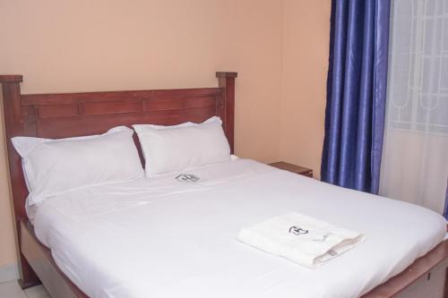 New Carnation Hotel Room