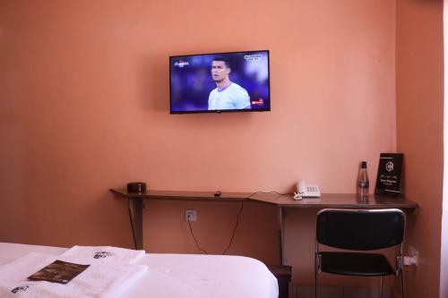 New Carnation Hotel Room