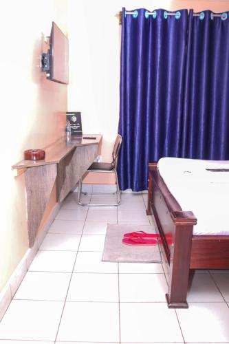 New Carnation Hotel Room
