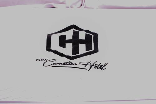 New Carnation Hotel Room
